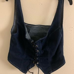 Lace up front asymmetrical hem denim top